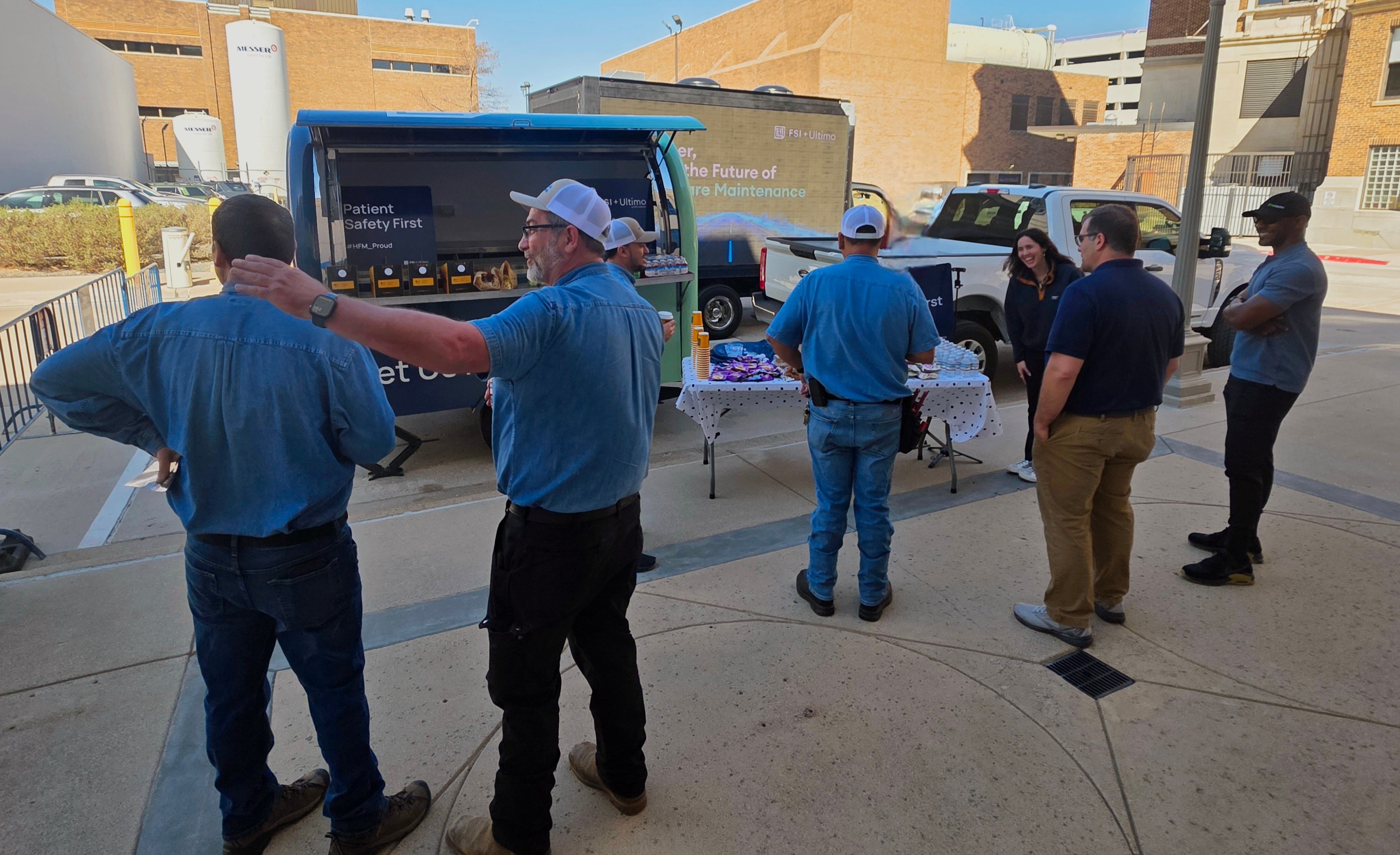 Roadshow attendees grabbing coffee